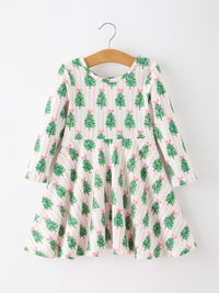Girls' long-sleeve Christmas dress with pink stripes, green holiday trees, and pink bow accents featuring a full twirl skirt.