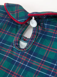Green plaid baby boys romper featuring a Peter Pan collar with red piping and a white snap button at the neck.