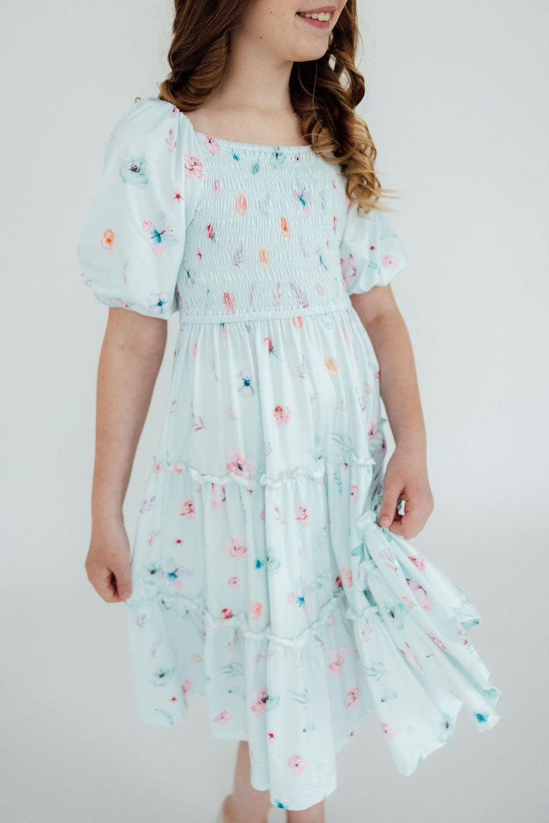 Comfortable and practical Butterfly Ballet Smocked Ruffle Dress from Mila & Rose® perfect for any occasion, showcasing vibrant colors and an enchanting ruffled skirt.