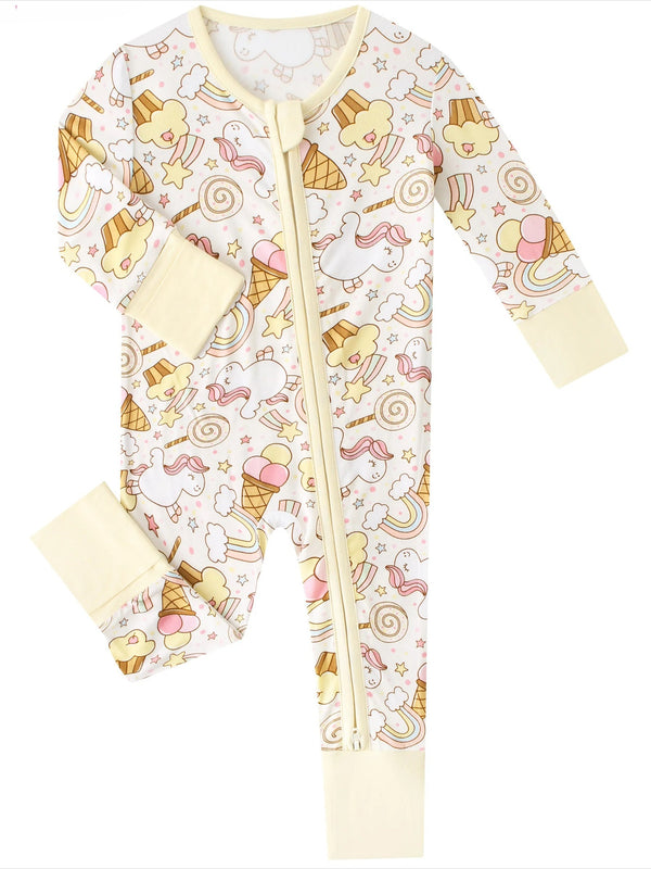 A baby long-sleeve footless zip-up sleeper with a cream background and a playful print of unicorns, ice cream cones, rainbows, and stars. The sleeves, cuffs, and zipper trim are solid cream.
