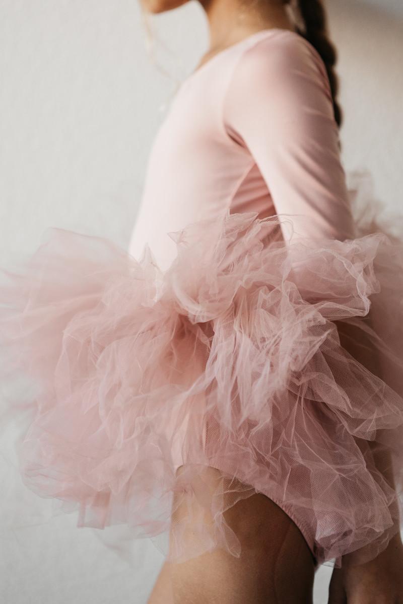 Group of children dancing in their Vintage Pink 3/4 Fluffy Tutu Girls Dance Leotards, celebrating friendship and joy.