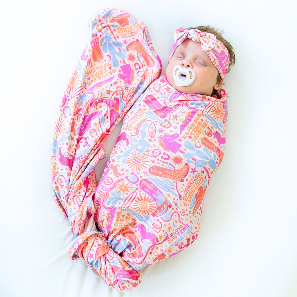 A beautifully designed large swaddle blanket featured in the Forever collection, perfect for babies.