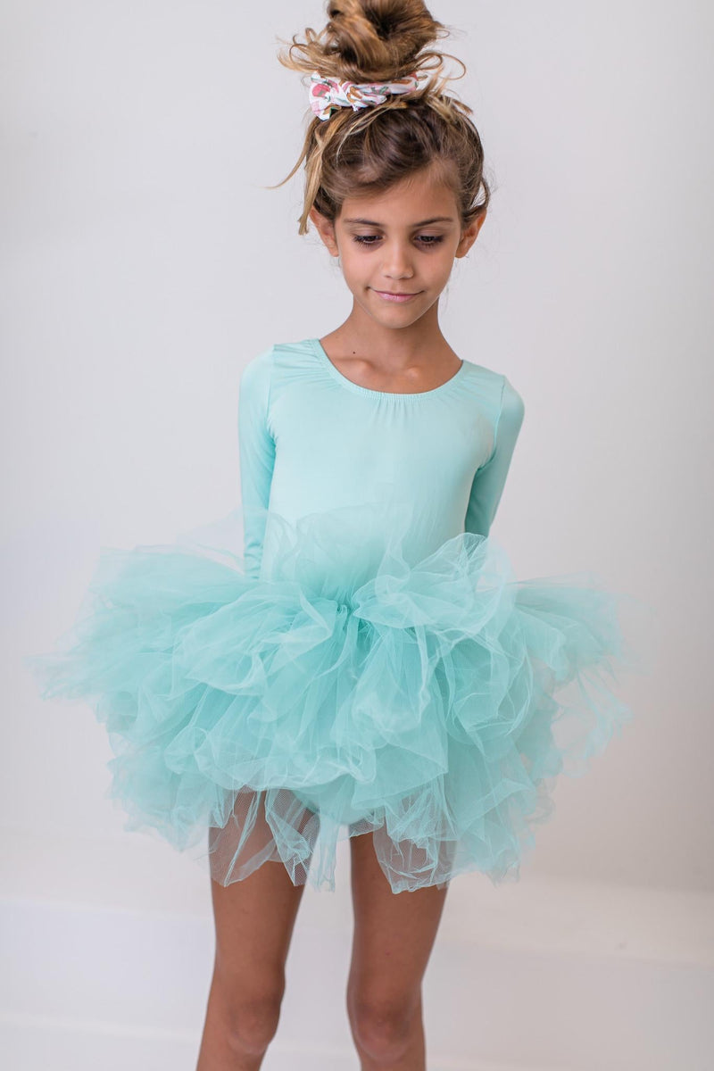Charming Sage 3/4 Tutu Leotard showcasing multiple layers for customizable fluffiness, ideal for young dancers and magic-filled occasions.
