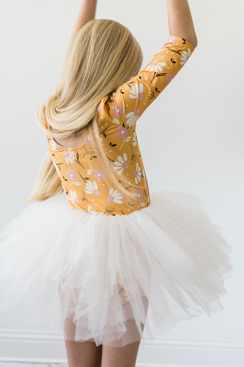Back view of the Dandelions in Fall 3/4 Tutu Leotard showcasing the soft floral pattern and full tulle skirt, ideal for dance activities.