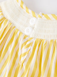 Spring/Summer Chick Floral Embroidery Smocking Girls Romper paired with summer sandals, ideal for a stylish outing.