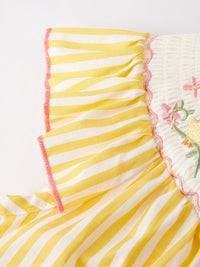Yellow and white striped dress with pink trim and smocked floral embroidery for girls