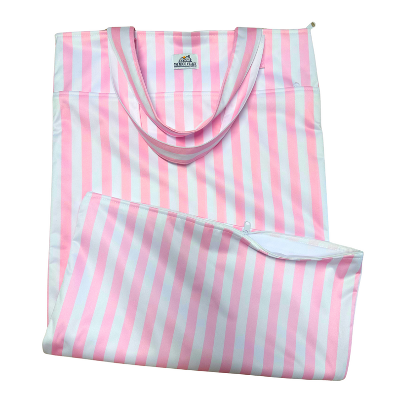 Large pink and white striped wetbag with hanging loop and zippered compartment for stylish on-the-go storage.