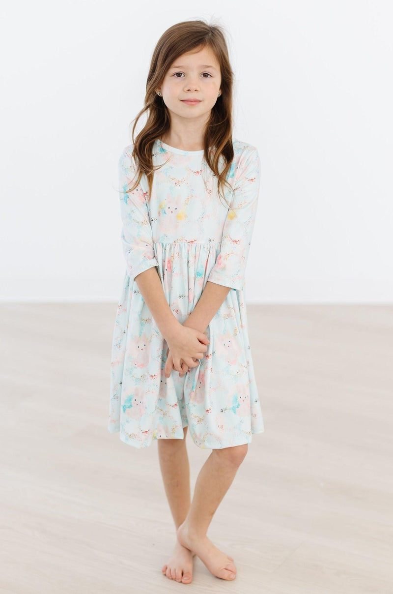 Bunny Dreams 3/4 Sleeve Pocket Twirl Dress for Girls showcasing the elegant ballet neckline and full twirl skirt.