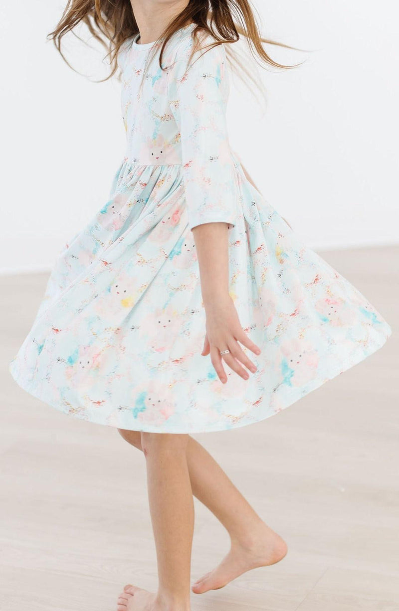 Bunny Dreams 3/4 Sleeve Pocket Twirl Dress for Girls - A charming twirl-ready dress featuring vibrant colors and comfy pockets for little treasures.