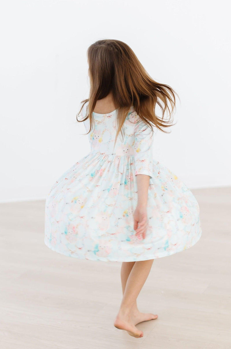 Bunny Dreams 3/4 Sleeve Pocket Twirl Dress for Girls - Showcasing a scoop back design, perfect for playful adventures and twirls that make every moment magical.
