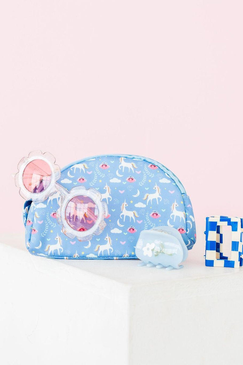 The Blue Moon Belt Bag displayed with stylish accessories, showcasing its cute design with unicorns set against a soft blue background, ideal for young fashionistas.