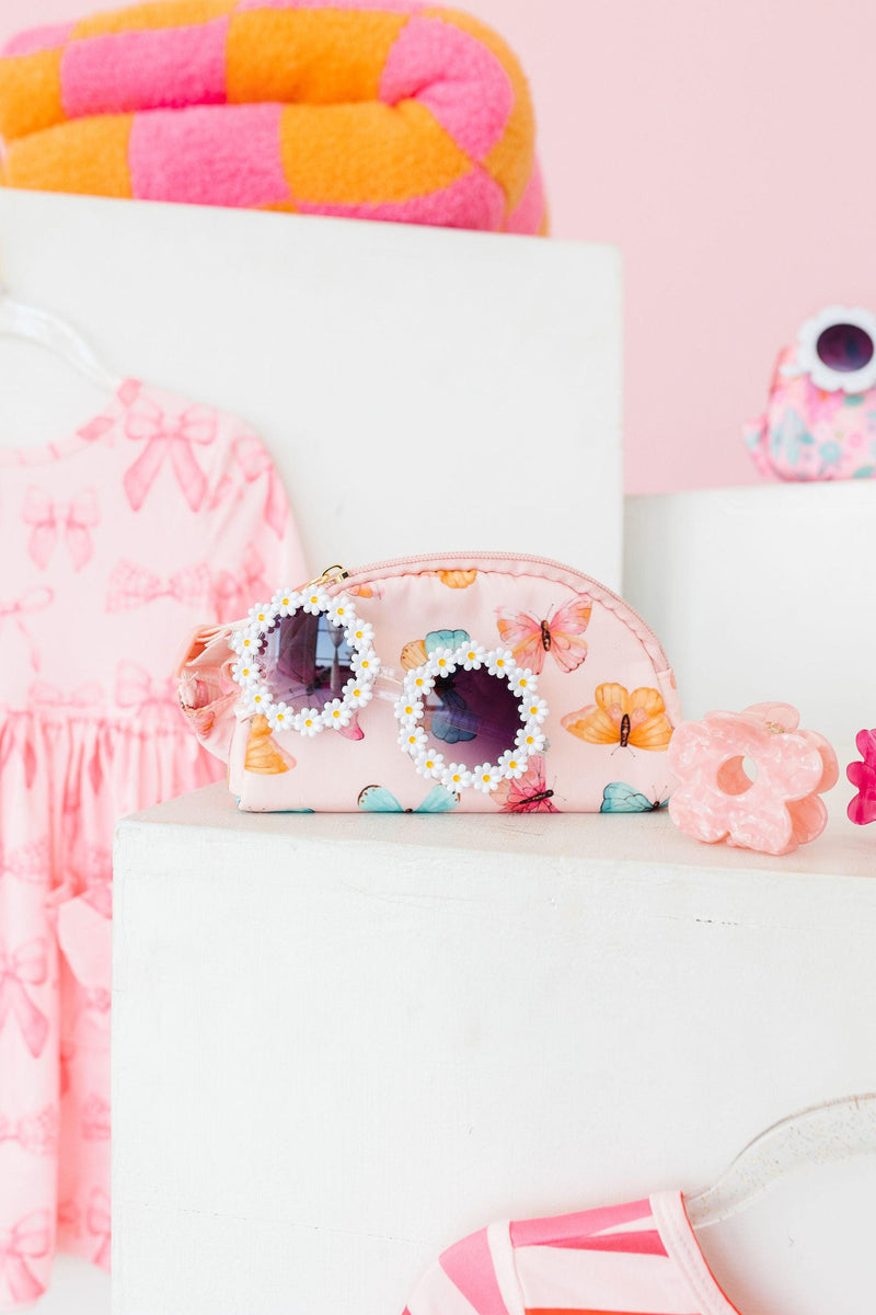 Charming Butterfly Kisses Belt Bag - Pink, designed for trendy kids, featuring an adjustable strap for a customizable fit and a stylish way to carry treasures.
