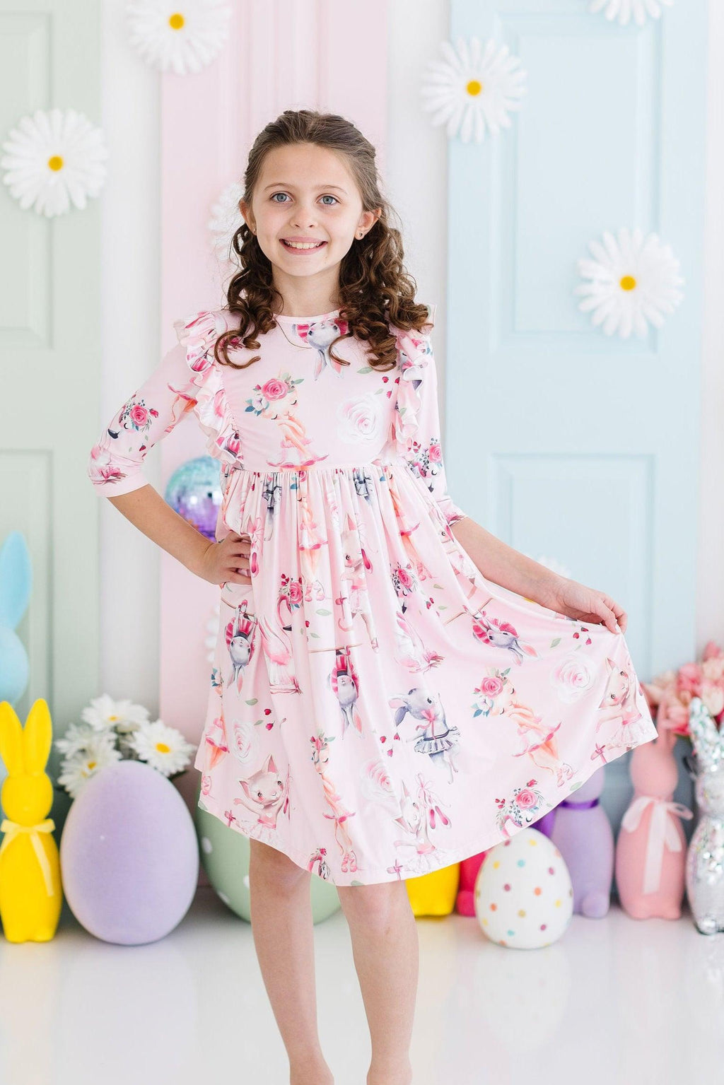 Ballet Beauties Ruffle Twirl Dress by Mila & Rose, showcasing a little girl twirling in a vibrant and comfortable dress, perfect for dancing and play.