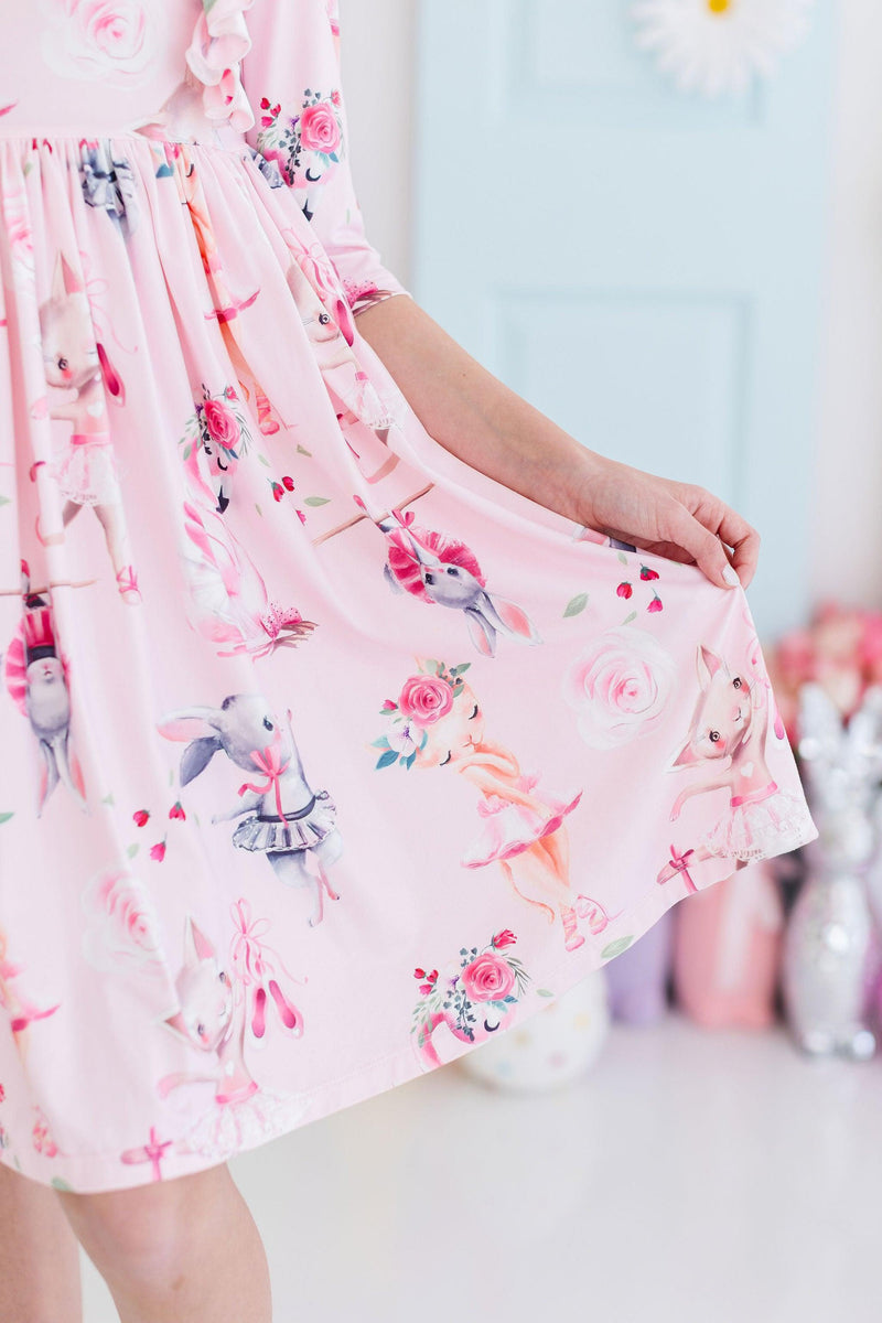 The full, flowing skirt of the Ballet Beauties Ruffle Twirl Dress by Mila & Rose, designed for twirling and active play, displayed in a bright and playful setting.