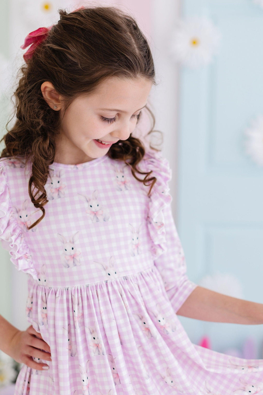 Adorable Baby Bunnies 3/4 Sleeve Ruffle Twirl Dress from Mila & Rose, perfect for young girls, featuring a twirly skirt and playful ruffle sleeves.