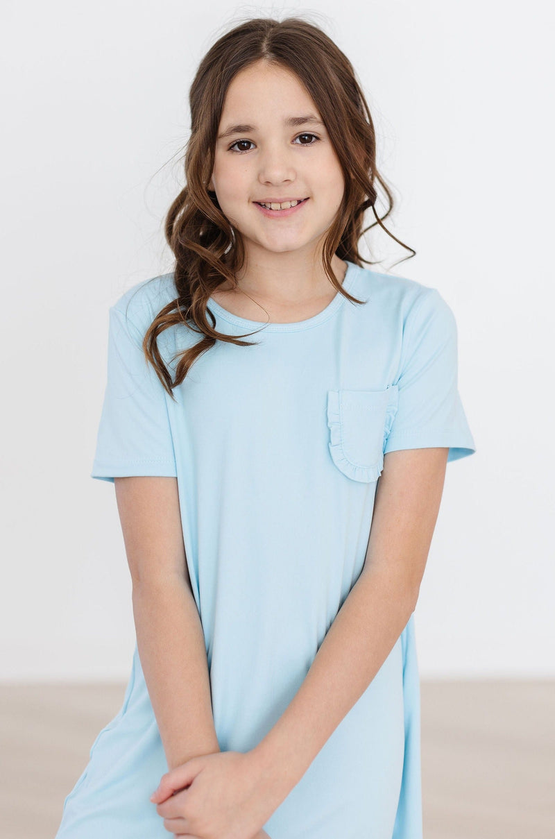 Versatile styling options for the Bluebird T-Shirt Dress, paired with leggings for added flair and comfort.