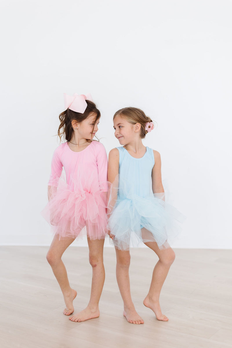 Bubblegum Pink 3/4 Tutu Leotard displayed against a bright background, showcasing the full and fluffy silhouette perfect for dance.