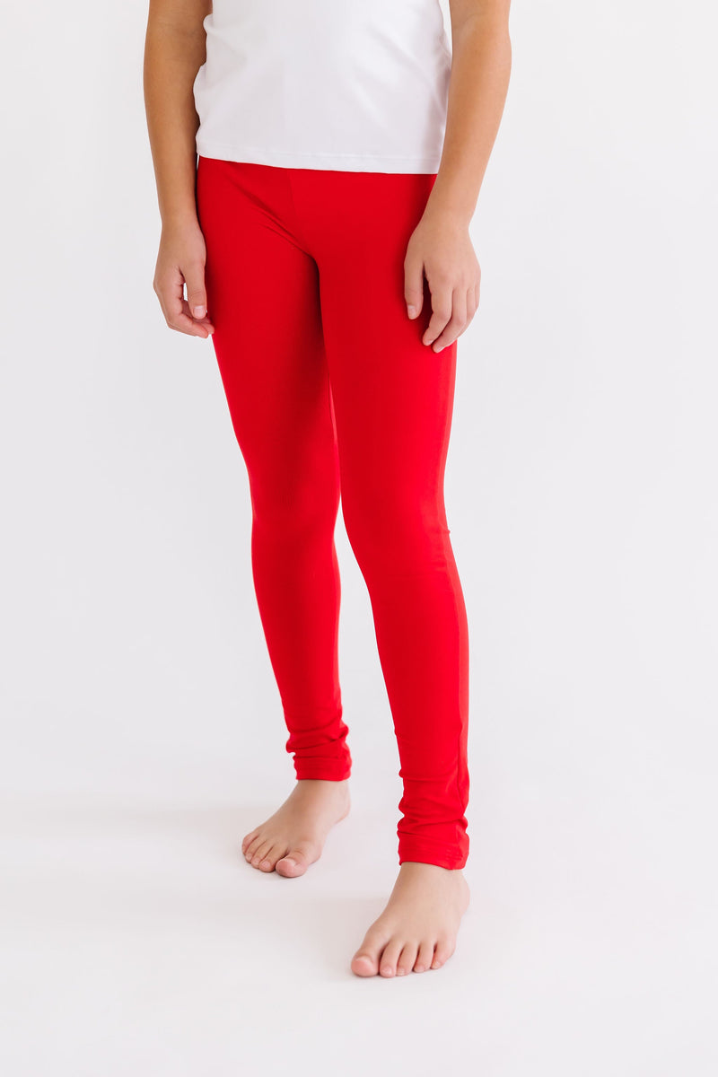 Red Slim-Fit Leggings for Girls, featuring a sleek design that combines fashion with comfort. These versatile slim fit leggings are great for playtime or dressing up.