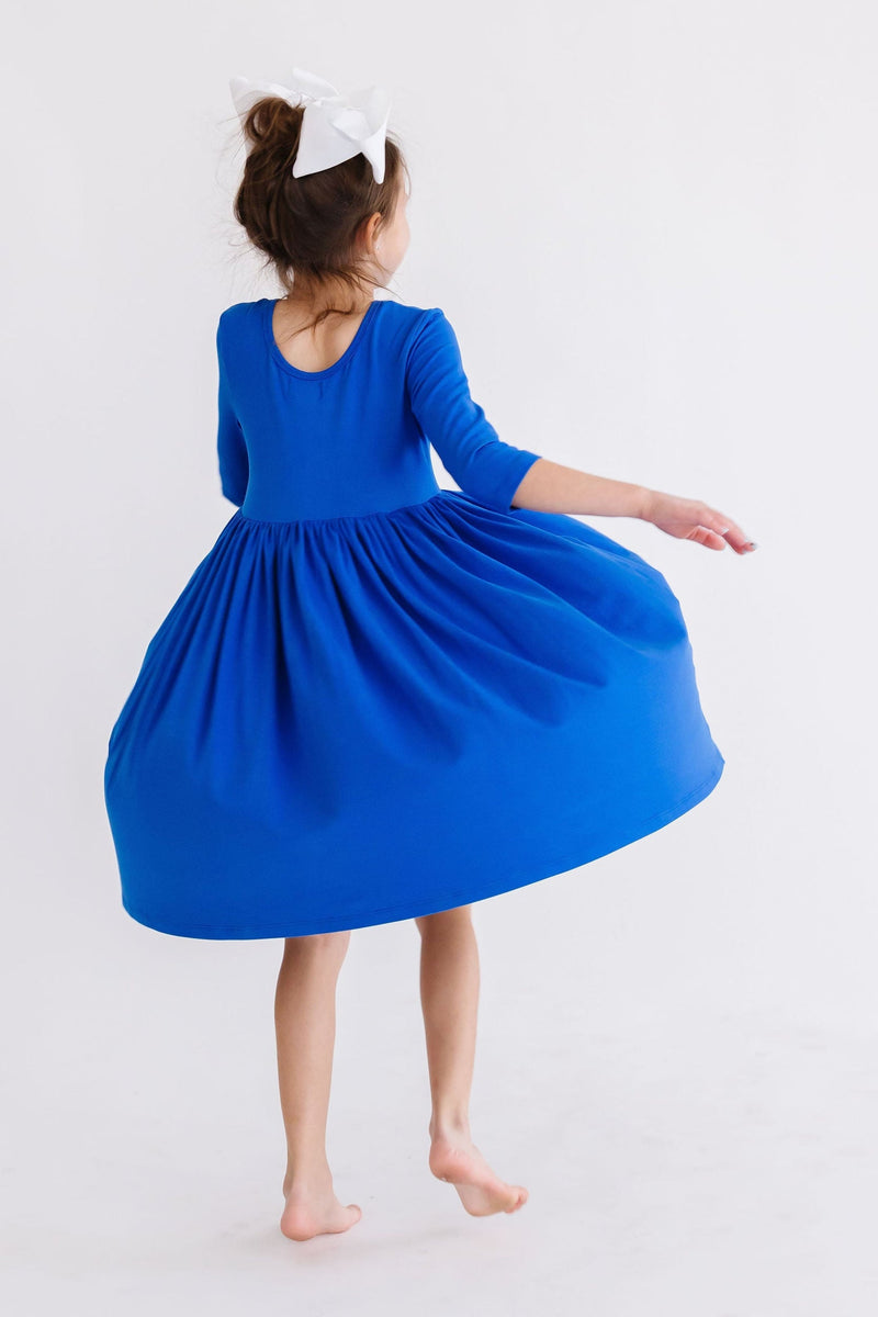 Versatile Royal Blue 3/4 Sleeve Pocket Twirl Dress by Mila & Rose paired beautifully with matching leggings, perfect for any occasion.