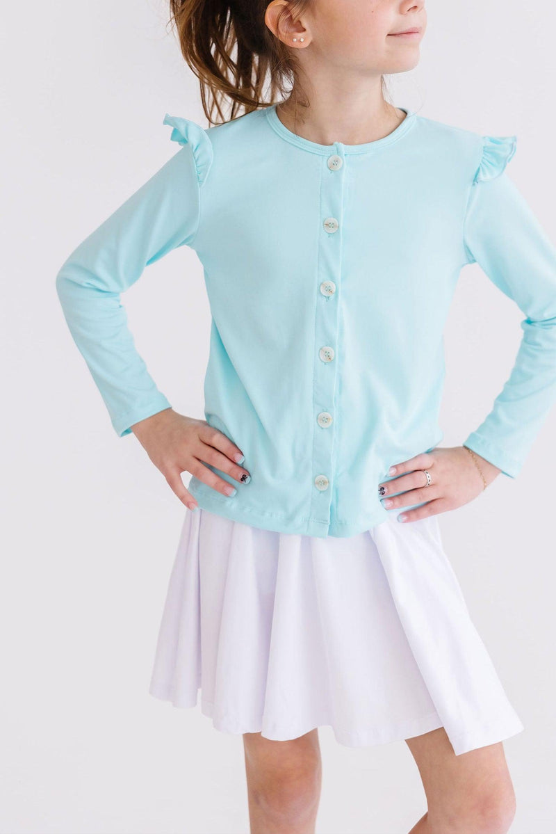 Playful and stylish Girl's Aqua Ruffle Cardigan featuring fluttery ruffles, ideal layering piece for your little fashionista.