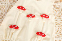 Cream 3D baby romper for infants with red mushroom applique details