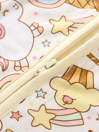 Close-up of a zipper on a fabric with cartoon characters and stars.
