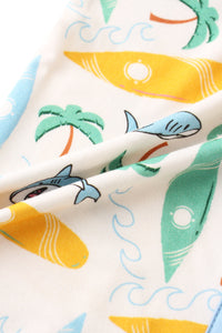 Fabric with shark and palm tree pattern on a white background