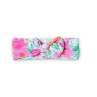 The SoftKnot Baby Bow Head Wrap - Babies and Toddlers - Flower Power. Close-up view showcasing the soft bamboo fabric of the softknot baby bow head wrap.