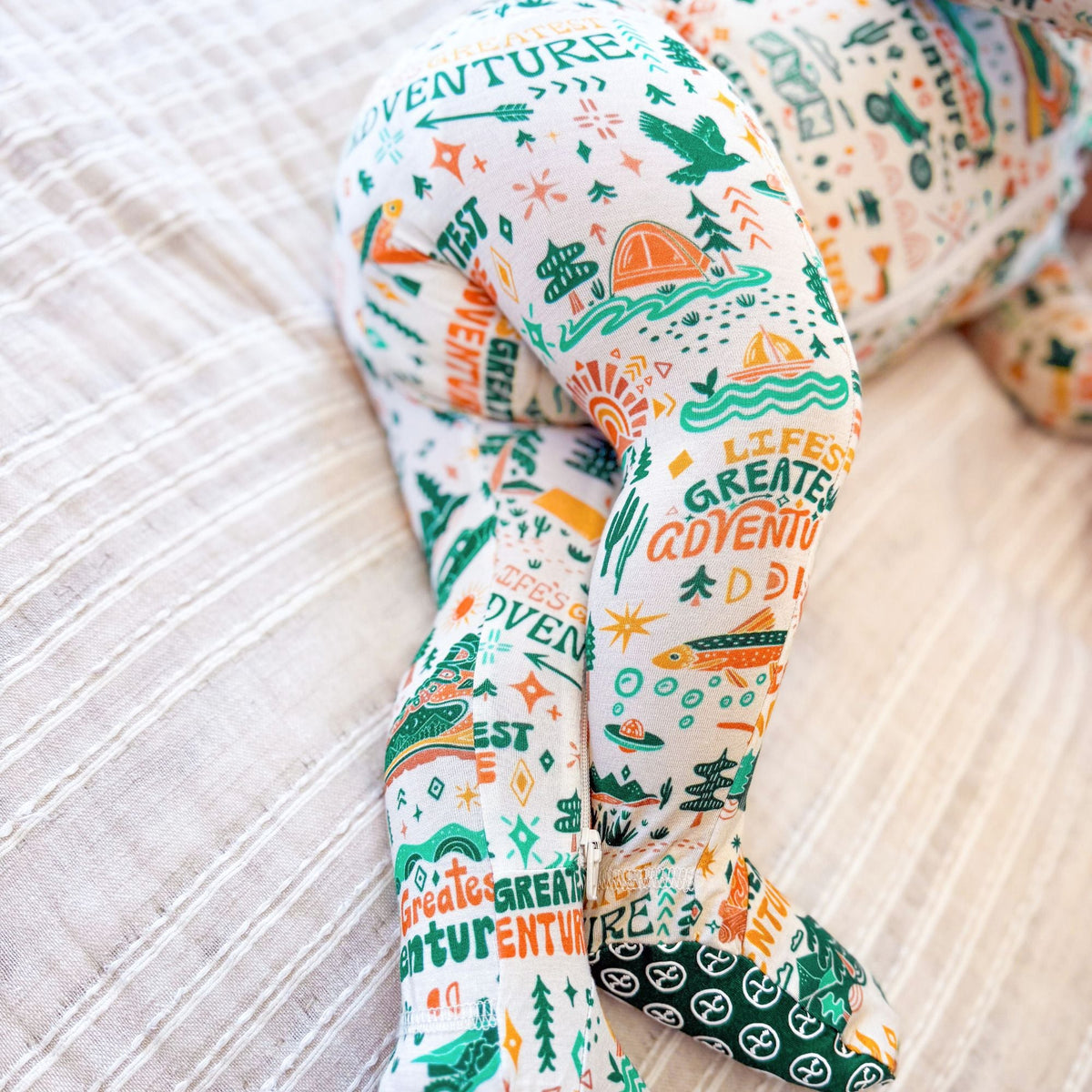 Leggings with adventure-themed print on a light background