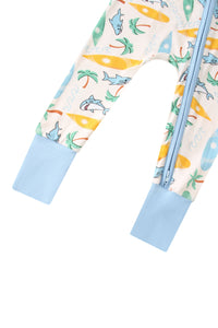 Children's onesie with shark and surfboard pattern on a white background