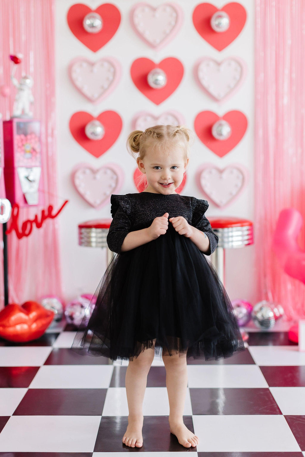 Black Shimmer 3/4 Sleeve Tutu Dress by Mila & Rose, featuring flutter sleeves and a fluffy tutu skirt, perfect for little princesses at special occasions.
