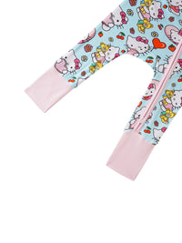Lower leg detail of light blue Hello Kitty romper with pink ribbed foot cuff and pink zipper track