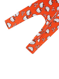 Detail of fold-over foot cuff construction and side zipper running down the leg of the orange romper.
