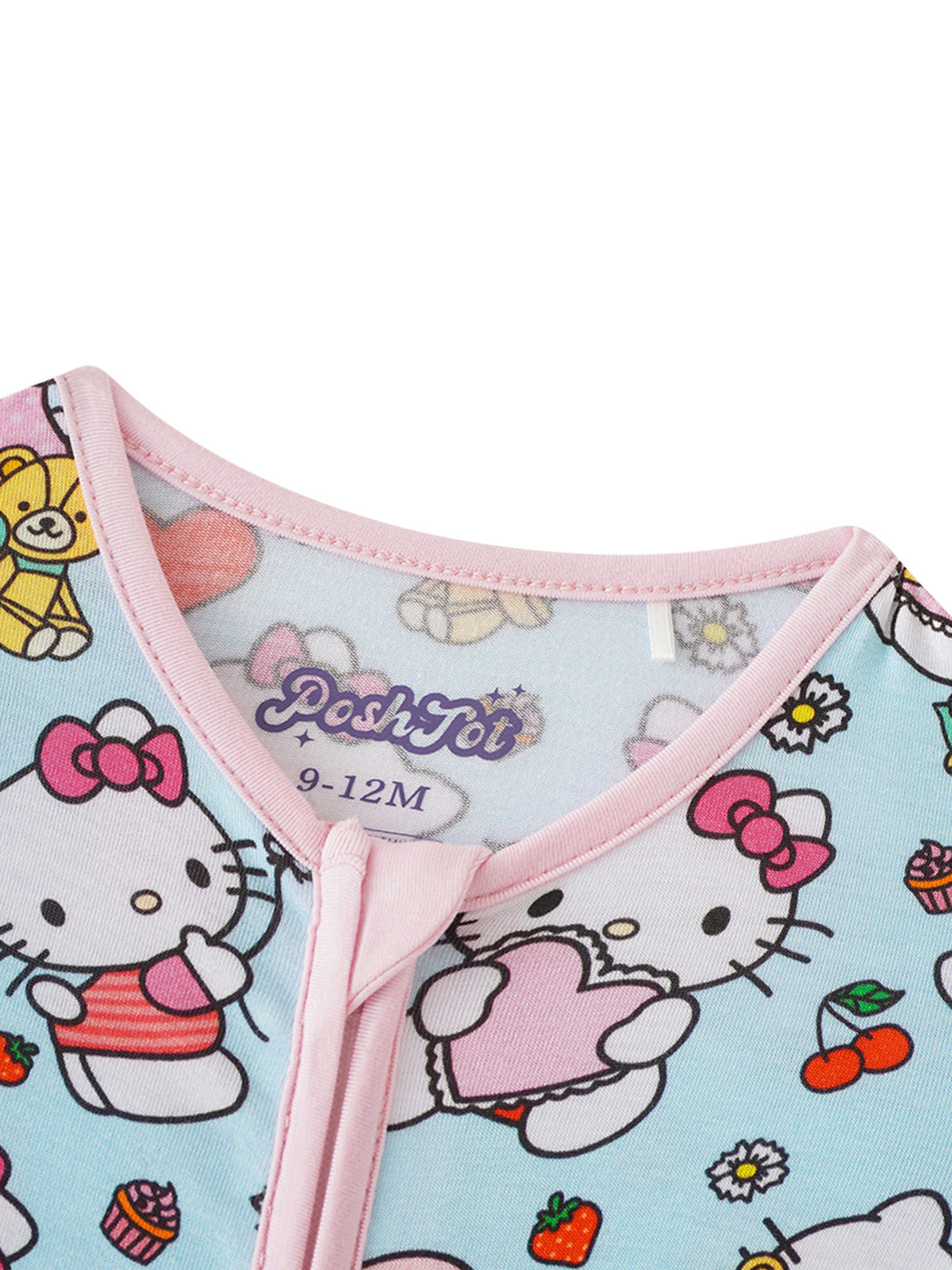 Close-up of pink ribbed collar and interior PoshTot tag on light blue bamboo baby romper