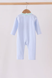 Back view of blue stripe baby romper with mint collar hanging on wooden hanger. Comfortable long-sleeve fit for casual wear.