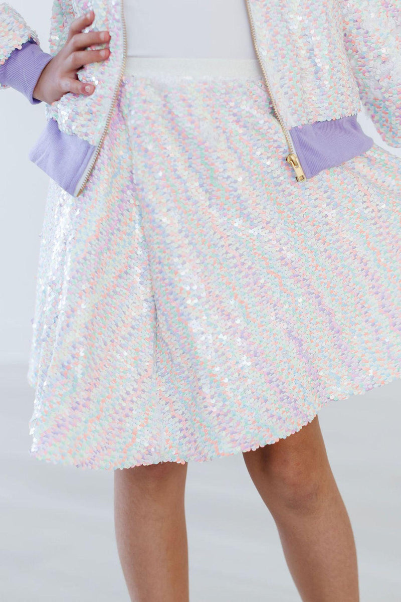 Unicorn Flip Sequin Twirl Skort featuring dazzling sequins, showcased with a stylish jacket, perfect for playful outfits.