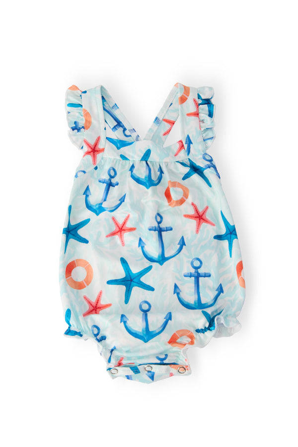 Anchors Away Ruffle Cross Back Romper: sea blue pattern, anchors and starfish, crisscross back straps, snap closures.