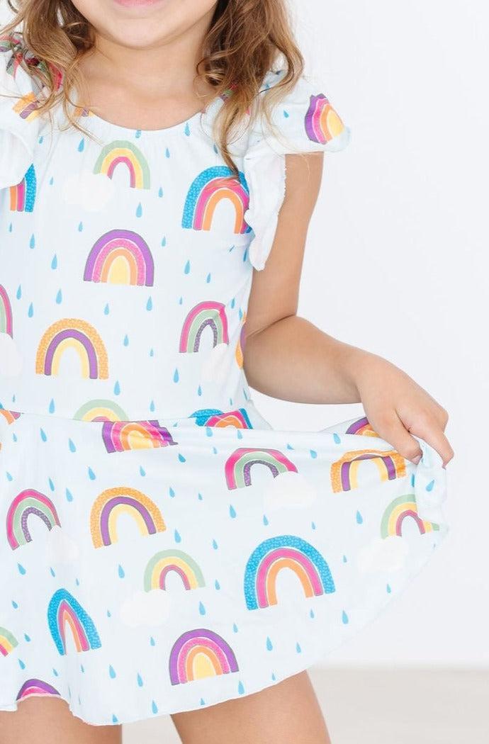 April Showers Short Sleeve Twirl Leotard for little dancers, white with pastel rainbows and raindrops, flutter sleeves