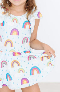 April Showers Short Sleeve Twirl Leotard for little dancers, white with pastel rainbows and raindrops, flutter sleeves