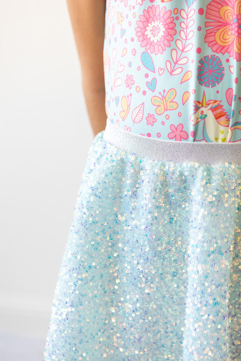 Close-up of the Aqua Sequin Twirl Skort by Mila & Rose®, highlighting the mesmerizing sequins and comfortable design, ideal for lively play and special occasions.
