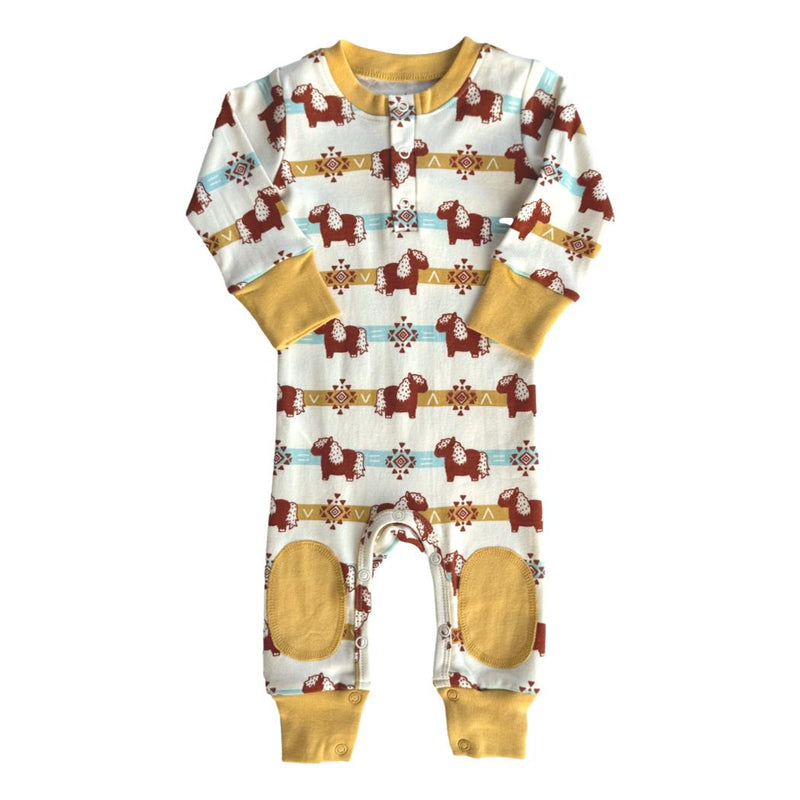 GOTS certified organic cotton crawler playsuit featuring an Aztec pony print with mustard yellow cuffs and reinforced knee patches.