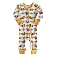 GOTS certified organic cotton zip romper featuring brown pony and geometric stripe pattern with yellow cuffs.