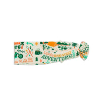 Colorful headband with nature-themed designs and text on a white background