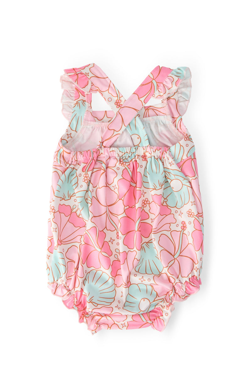 Cute Beach Daze Ruffle Cross Back Romper by Mila & Rose, perfect for summer fun and beach days, featuring cross-back design and adorable ruffles.
