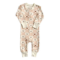 GOTS certified organic cotton playsuit with pink checkered bear print, long sleeves, and snap buttons for easy diaper changes.