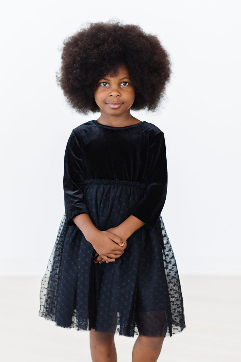 Black Velvet Tutu Dress for Girls - A beautiful and elegant black velvet dress featuring a full tulle skirt, perfect for special occasions and twirling fun.