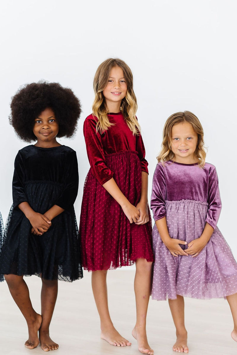 Close-up of the Black Velvet Tutu Dress for Girls by Mila & Rose, highlighting the luxurious black velvet fabric and detailed stitching, ideal for birthdays and festive celebrations.
