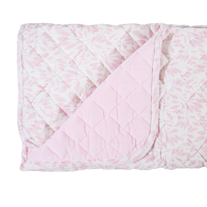 Detail of Goosewaddle® Super Soft Play Mats displaying the quilted design and reversible feature, showcasing its soft, cozy fabric for baby playtime.
