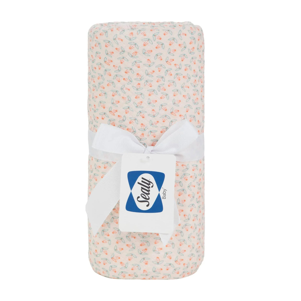  knit blanket in white with small pastel orange and green floral pattern made of soft, breathable material
