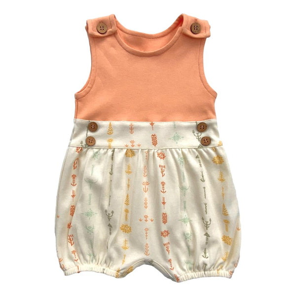 GOTS certified organic cotton bubble romper with peach top and boho floral print. Features wooden buttons and chemical-free safety for babies.